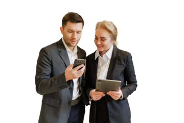 Business professionals discussing project details while reviewing documents in a modern office setting