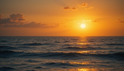Fototapeta premium Serene Sunset Over Calm Ocean Waves with Warm Golden Hues