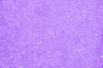 A soft lilac bokeh-style background with unfocused light creates an elegant space for text or design elements.