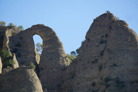 scenic view of Les M&eacute;es, an unusual rocky outcrop in the South of France with the neddle hole