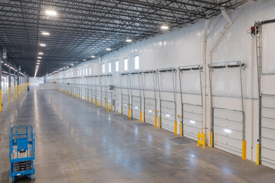 Interior view of large warehouse loading docks.