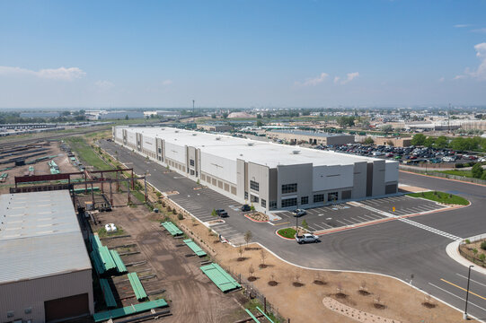 Aerial view of large industrial warehouse building near Denver, Colorado, USA.