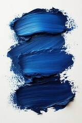 Abstract blue art on canvas featuring bold brush strokes