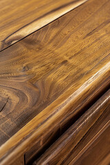 Exuding Warmth and Sophistication: A Striking Display of Polished Teak Wood Furniture