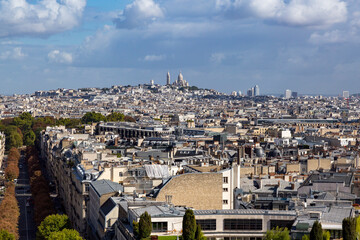 Obraz premium Europe, Paris. Boulevard Champs Elysees . View from the top of the Arc de Triomphe toward Montartre and Sacré-Coeur Basilica.