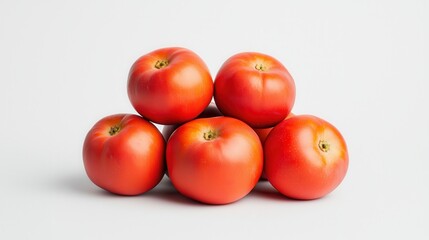 A vibrant stack of fresh red tomatoes against a minimalistic background, showcasing their smooth skin and natural color.