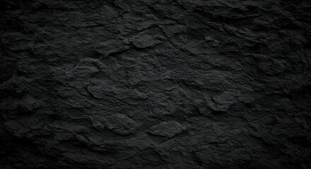 Fototapeta premium Black abstract background. Grunge background with copy space. The surface of the mountain close-up. Dark gray stone background. Rock texture.
