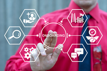 Business person using virtual touch screen push word: ONBOARDING. Welcome onboard. Onboarding...
