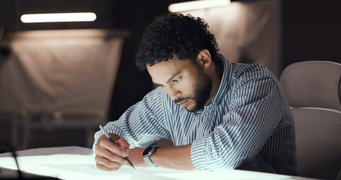 Drawing, sketch and man with paper for car, vehicle and automobile prototype at night in studio. Creative designer, artist and person with blueprint, ideas and illustration for structure or model