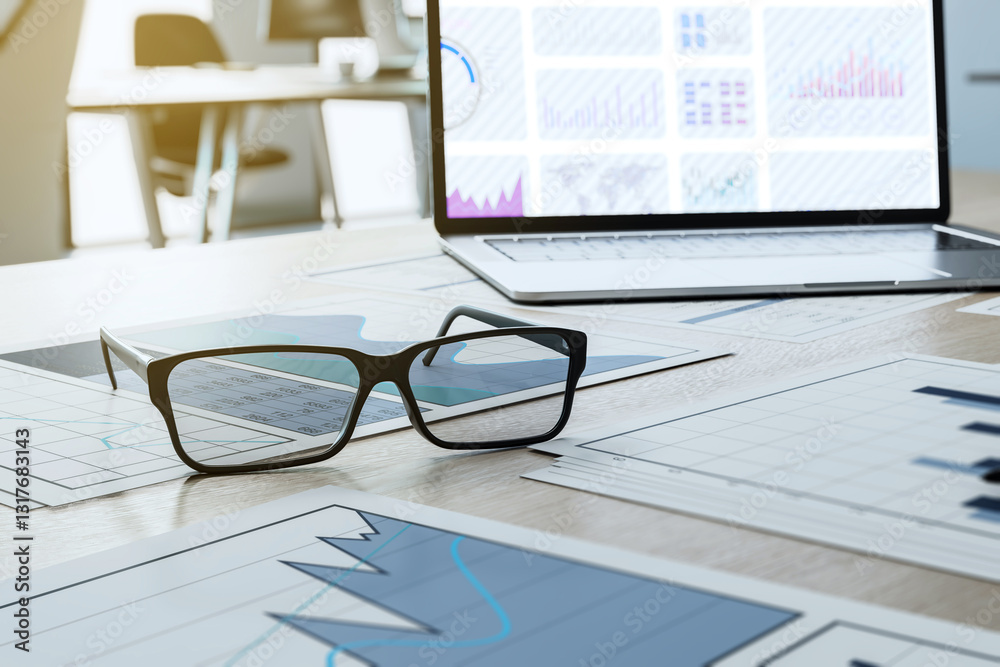 Poster financial charts and graphs on office desk with glasses and laptop. 3d rendering