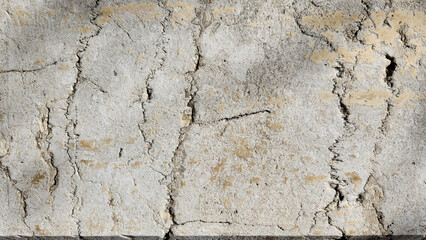 Texture of a ancient hand carved wall stone as a natural backgorund for design works 
