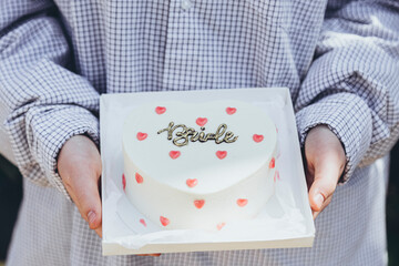Heart shaped bento cake for a hen party with the inscription Bride, close up.