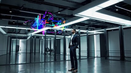 Confident businessman in a modern office analyzes a colorful glowing 3d financial data hologram floating in the air, representing innovation and future technologies