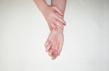 Beautiful refined female hands close-up. Hand care concept, anti-aging cream, spa.