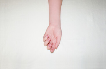 Beautiful refined female hands close-up. Hand care concept, anti-aging cream, spa.