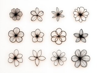 Obraz premium Twelve minimalist floral line art designs on white background; ideal for stationery