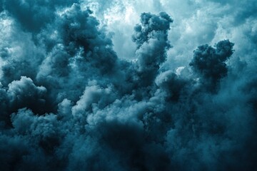 Fototapeta premium Dramatic dark storm clouds swirling in a moody sky backdrop