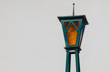 Green Metal Lantern with Orange Stained Glass Mosaic