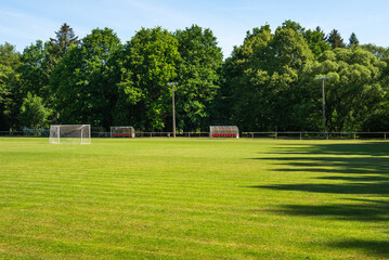 Obraz premium small training soccer field. football field with a green grassy covering.