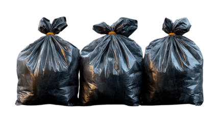 Bags of refuse: Three tied up black plastic trash bags, neatly arranged, symbolizing waste disposal and environmental concerns.