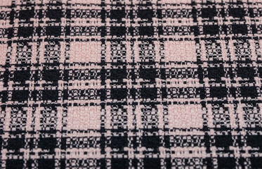 Pattern and texture of black and white checkered semi-knitted fabric