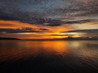 Golden Sunset Over a Tranquil Sea in the Philippines