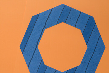 striped blue octagonal frame on orange