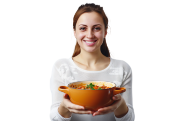 young woman holding a pot of delicious soup in her hands isolated on transparent background