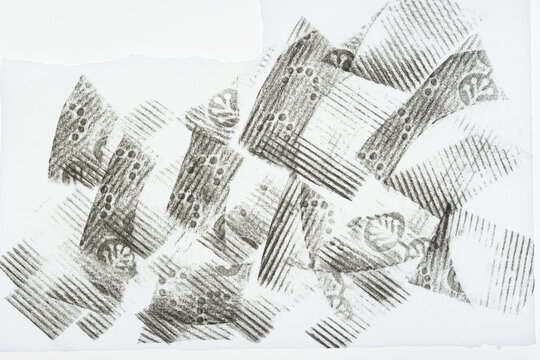 abstract shapes (stripes or lines) impressions partly overlapping on tissue paper