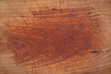 Old wooden chopping board texture background. Wooden chopping board with traces of use. old wood background