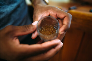 Man holding tobacco seeds
