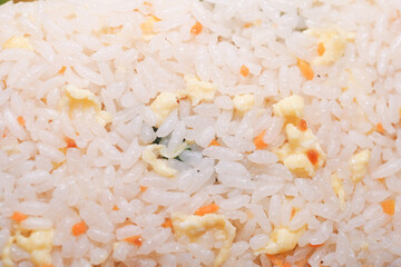 Fried rice with vegetables and egg served in a bowl