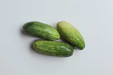 Three fresh cucumber, isolated on white background