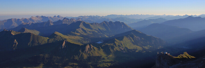 Sunrise view from Glacier 3000, Switzerland. Mountain ranges and Lake Arnensee, Switzerland.