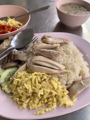close up view of delicious asian food, steamed rice topped with chicken