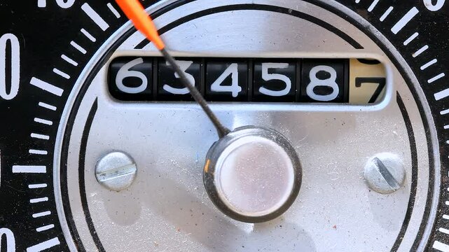 Tenths Column Of A Mechanical Odometer Advances From Six To Zero