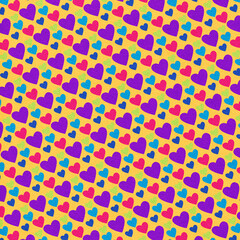 Colorful seamless heart pattern on yellow background. Bright playful Valentine design for kids, love themed fabric, wrapping paper, party decor and digital projects.