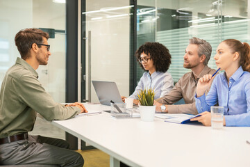 Fototapeta premium Job interview process is in office. Human resources, meeting and group of hiring candidates for vacancy.