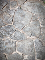 Gray stone wall background. Nature abstract background. Textured surface flat stones.