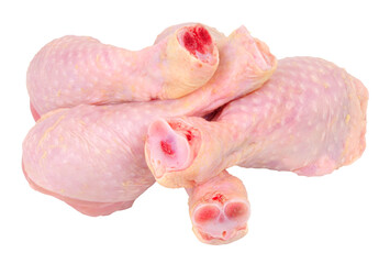 Group of fresh raw prepared skin on chicken drumstick legs isolated on a white background