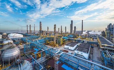 Aerial view of a large oil refinery and chemical plant under sky