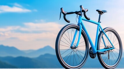 Fototapeta premium Blue bicycle against a scenic mountain backdrop.