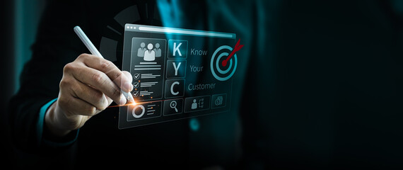 Businessman using a digital pen to interact with a futuristic KYC Know Your Customer interface, representing customer identity verification, compliance, anti-fraud measures, digital banking solutions.