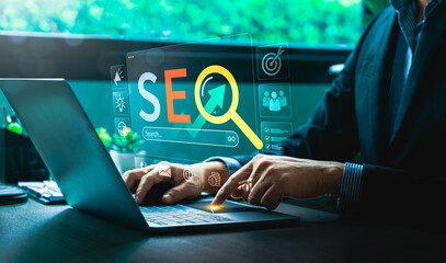 Digital Marketing Expert Analyzing SEO Strategies on Laptop with Futuristic Virtual Interface,...