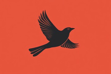 Obraz premium A captivating silhouette of a black bird in flight, set against a vibrant orange background. This design symbolizes freedom and elegance, perfect for art enthusiasts.