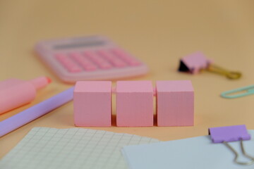 flat lay of a blank space for text. Educational and financial concept with text space on white background. surrounded by tools such as pen, alarm clock and calculator