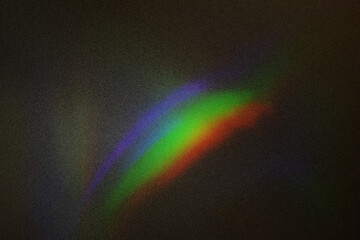 Abstract blurred colorful lens flare bokeh on black