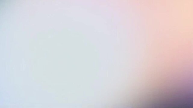 Abstract clowing background with multicolored blurred gradients moving on light color gradient background.