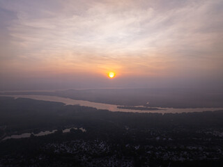 Aerial view sunset sky,Nature beautiful Light Sunset or sunrise over sea,Colorful dramatic majestic scenery sunset Sky with Amazing clouds and waves in sunset sky purple light cloud background