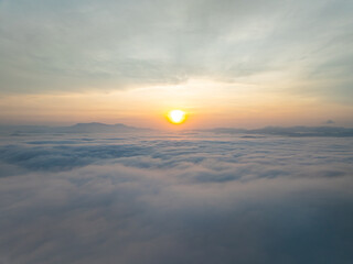 Drone aerial view of landscape fog over mountains in sunrise sky,High angle view over countryside at Southeast asia,Phang Nga Thailand,Wide angle view nature landscape